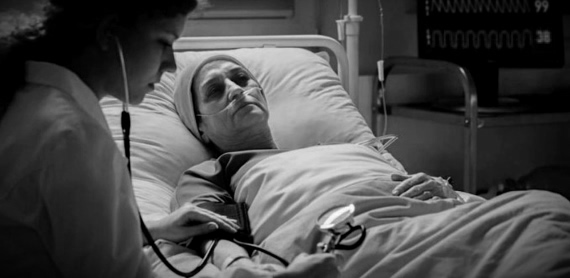 Nurse With Terminal Patient
