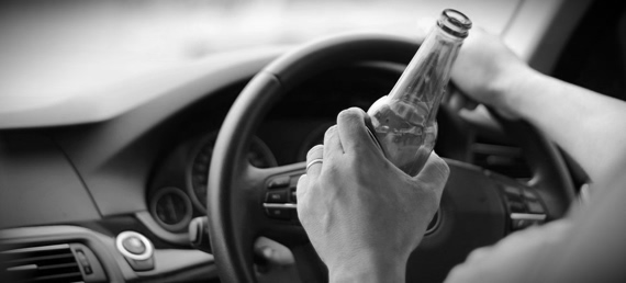 Driver With Beer in His Hand