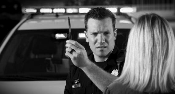 Policeman Conducting Field Sobriety Test